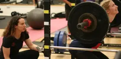 sally moss instructing a client's in the gym
